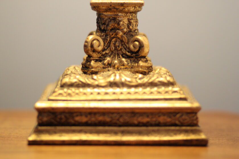 closeup of gold lamp base